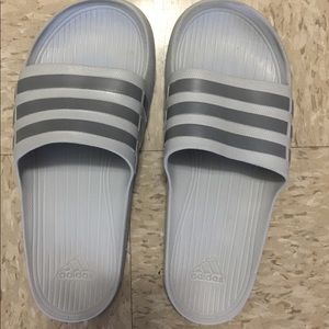 Adidas slides.